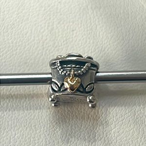 Retired Pandora Unforgettable Moments jewelry box charm.